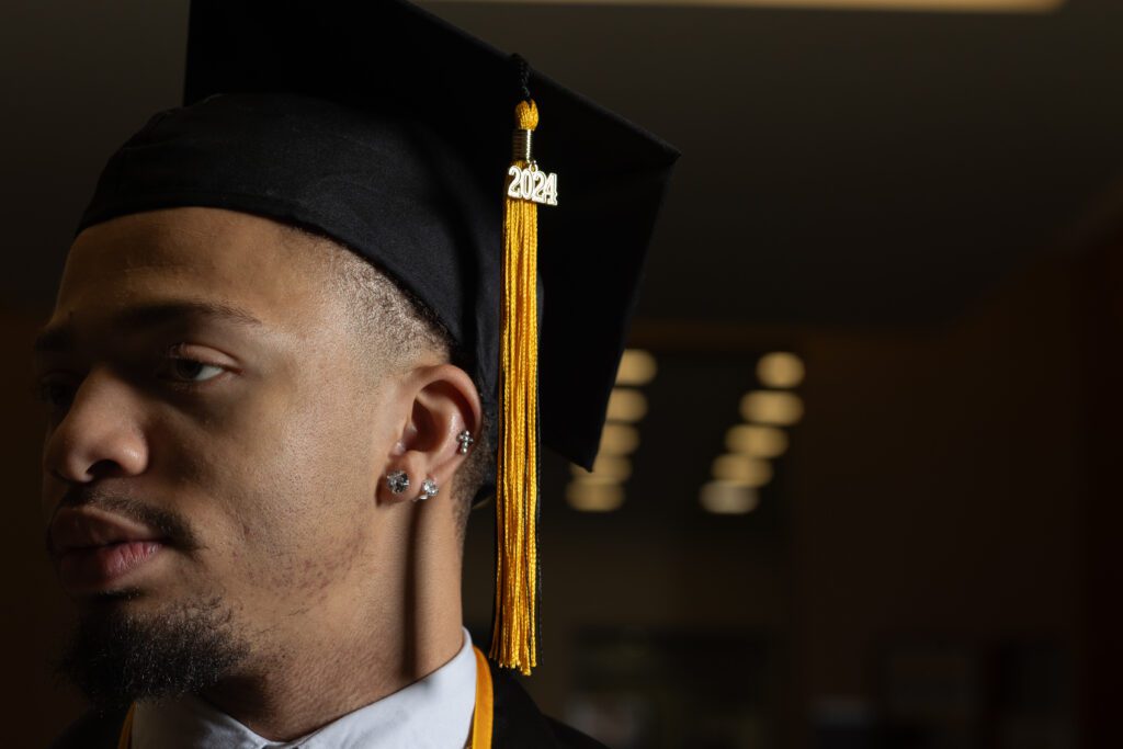 dmv graduate focusing on tassel